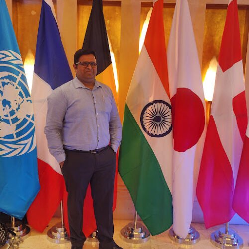 MediGrow Digital - Puran Pandey with Counties Flag